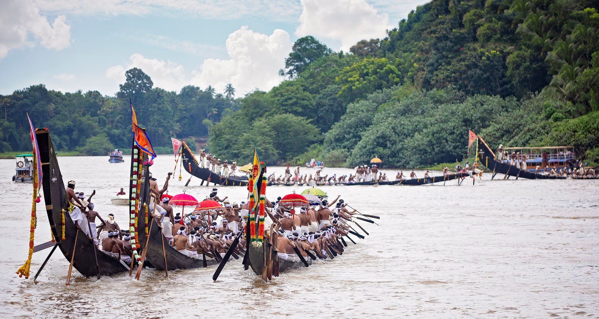 People Riding on Big Boats on Water